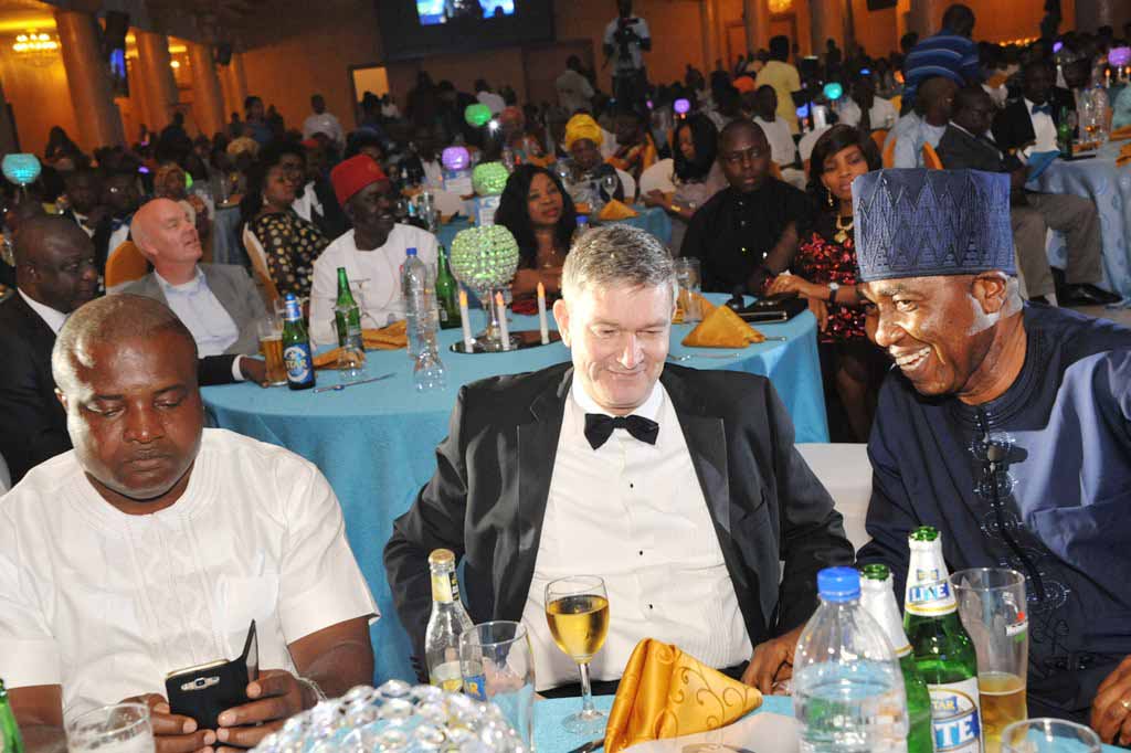 L-R: Mr. Ken Maduakor, Nigerian Breweries Plc Distributor of the Year; Mr. Nicolaas Velvede, Managing Director Nigerian Breweries; and Mr. Hubert Eze, Sales Director, Nigerian Breweries at the Distributors Award Night in Lagos on Friday.