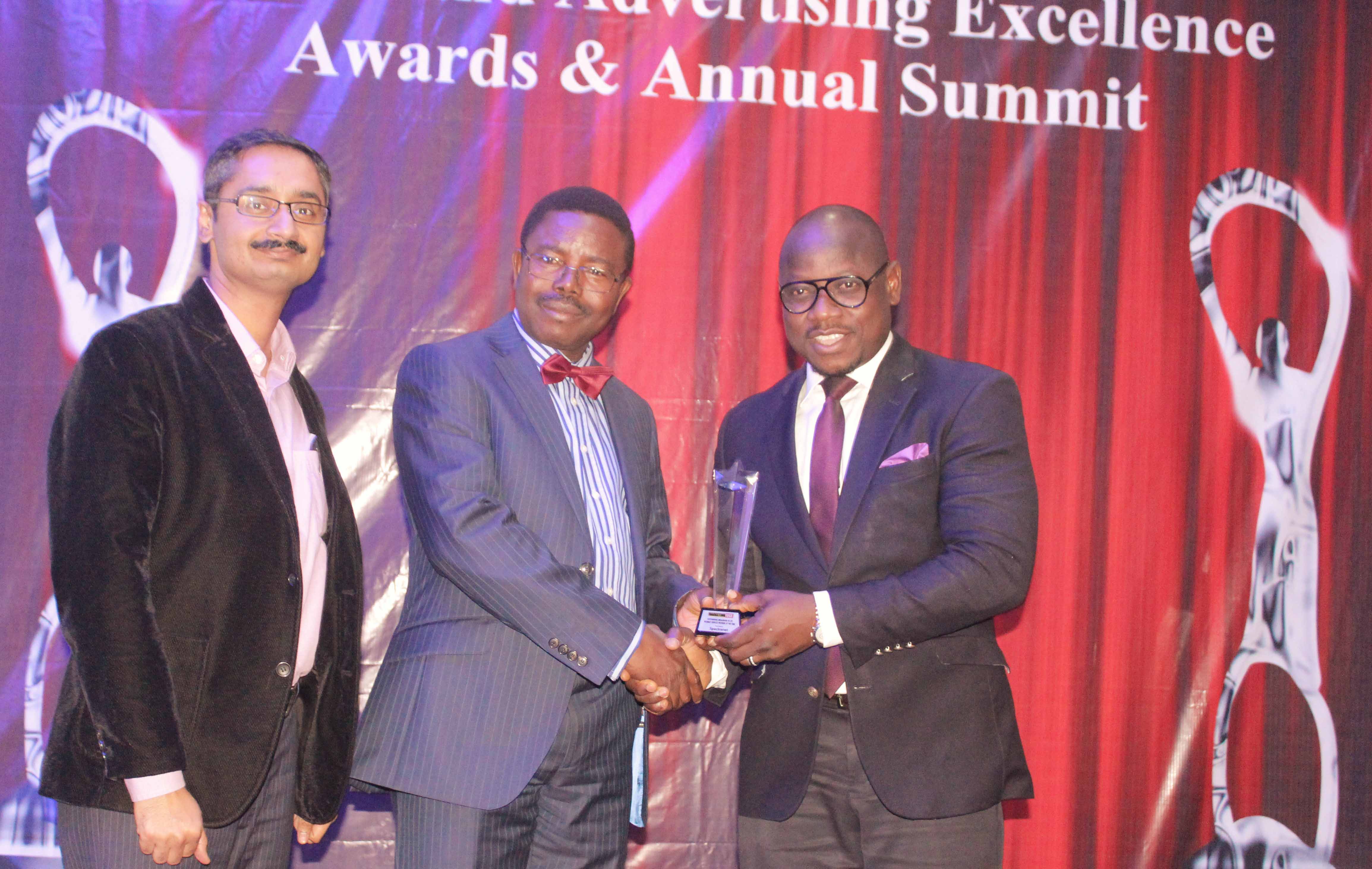 L-R - Head of Sales, Spectranet 4g LTE, Pankaj Manan, CEO, ROCK CITY FM, Abeokuta, Dr Niran Malaolu presenting the award of Outstanding Broadband 4g LTE, Internet Provider of the year to the Marketing Manager Spectranet 4g LTE, Samon Akejelu during the just concluded Marketing Edge, National Marketing Stakeholders Summit and Brands and Advertising Excellence Award at the Civic Centre, Victoria Island, Lagos recently  