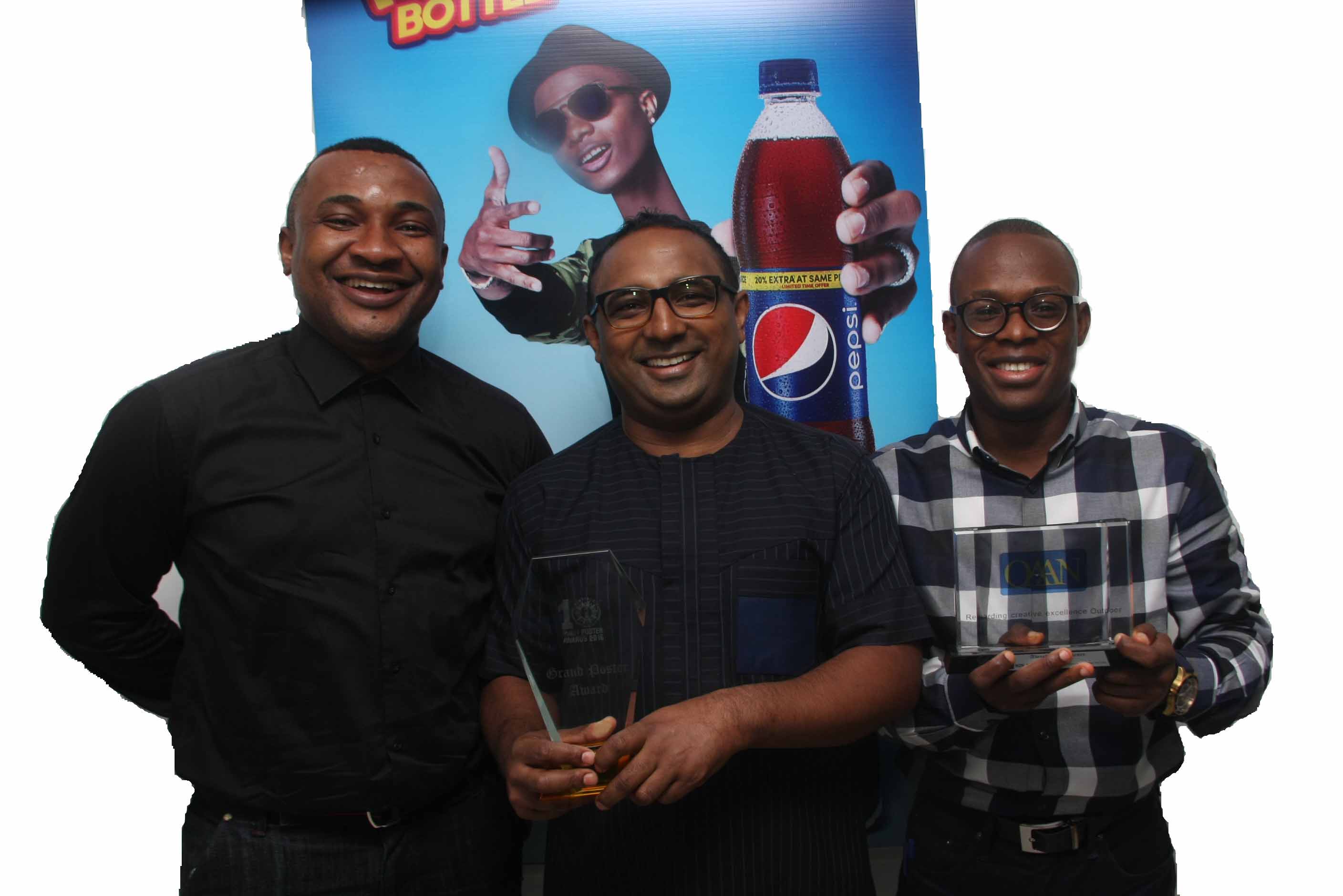 L-R: Account Director, Insight Communications, Jones Bassey, Head Marketing, Seven-Up Bottling Company Plc, Norden Thurston, and Brand Manager, Seven-Up Bottling Company Plc, Segun Ogunleye displaying the OAAN’s Overall Grand PRIX Award won by Pepsi Long throat campaign.
